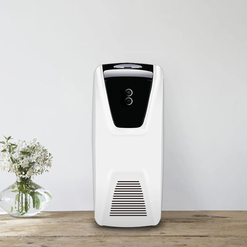 Dispensador automático de fragancias con sensor de luz