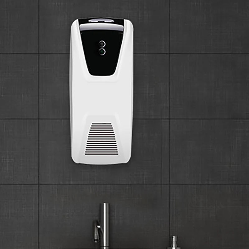 Dispensador automático de fragancias con sensor de luz